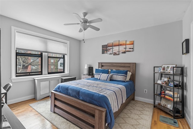 68 E Hartsdale Ave Unit 3K, Hartsdale, NY 10530 - bedroom with wood finished floors and a ceiling fan