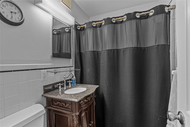 68 E Hartsdale Ave Unit 3K, Hartsdale, NY 10530 - bathroom with vanity, a shower with shower curtain, and tile walls