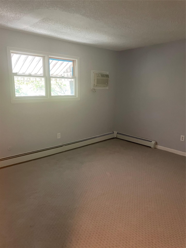38 Sheffield Dr, Middletown, NY 10940 - carpeted empty room featuring a wall mounted AC and a textured ceiling