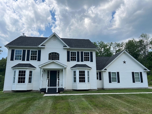 232 Minisink Tpke, Westtown, NY 10998 - colonial house featuring a front yard and roof with shingles