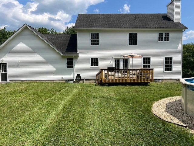 232 Minisink Tpke, Westtown, NY 10998 - back of house with a wooden deck, a chimney, a lawn, and a shingled roof