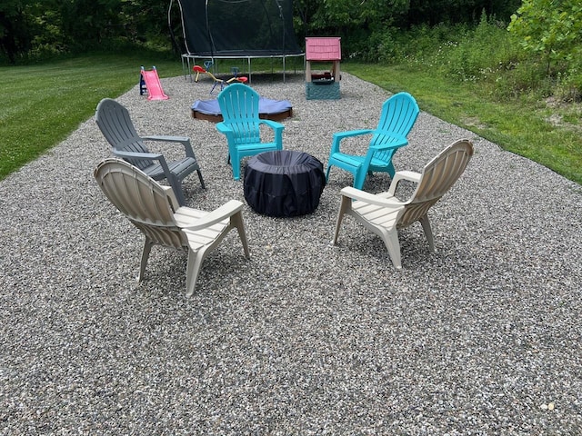 232 Minisink Tpke, Westtown, NY 10998 - view of patio / terrace featuring a trampoline and an outdoor fire pit