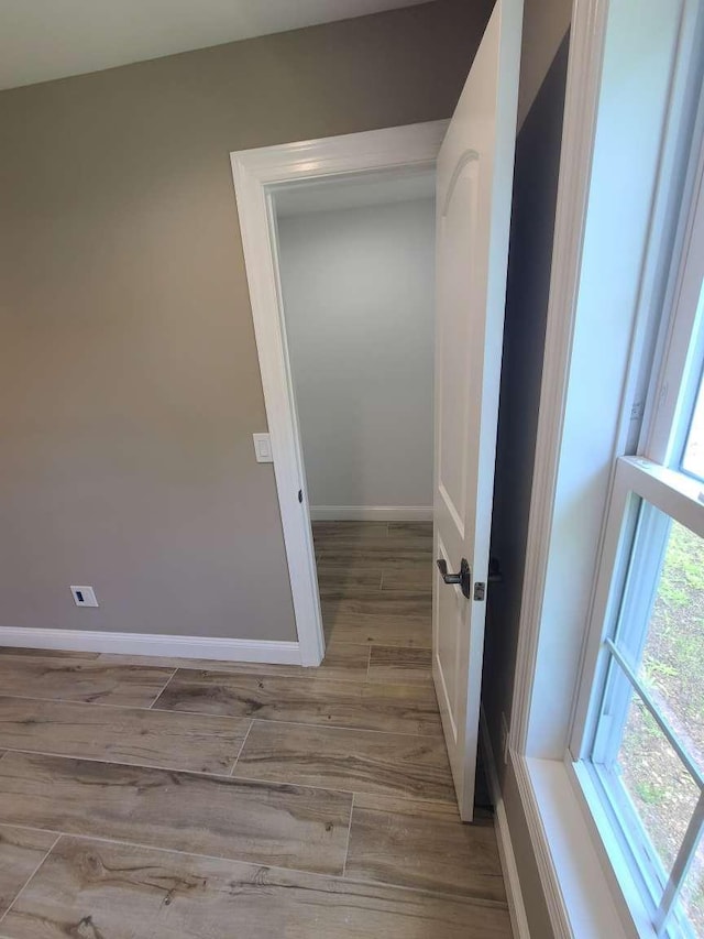 56 Bayberry Ln, Levittown, NY 11756 - hall with wood finished floors and baseboards
