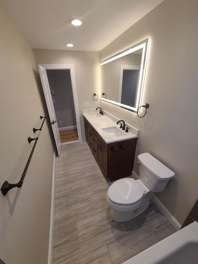 56 Bayberry Ln, Levittown, NY 11756 - full bath with double vanity and recessed lighting