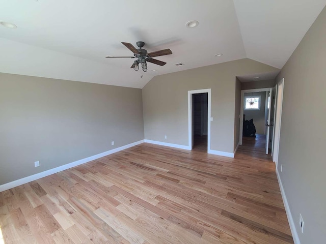 56 Bayberry Ln, Levittown, NY 11756 - empty room featuring vaulted ceiling, a ceiling fan, light wood finished floors, and recessed lighting