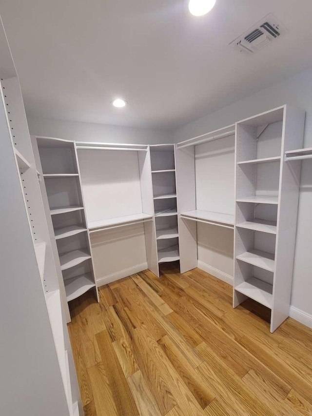 56 Bayberry Ln, Levittown, NY 11756 - spacious closet featuring wood finished floors