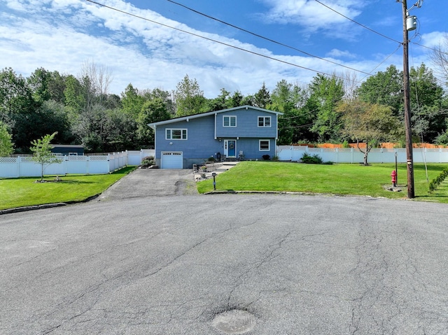 7 Walnut Ct, Goshen, NY 10924 - view of front of house featuring an attached garage, driveway, and view of wooded area