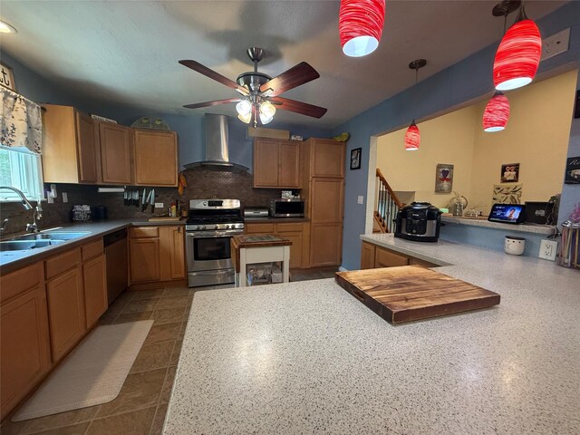 7 Walnut Ct, Goshen, NY 10924 - kitchen featuring wall chimney exhaust hood, appliances with stainless steel finishes, backsplash, a ceiling fan, and pendant lighting
