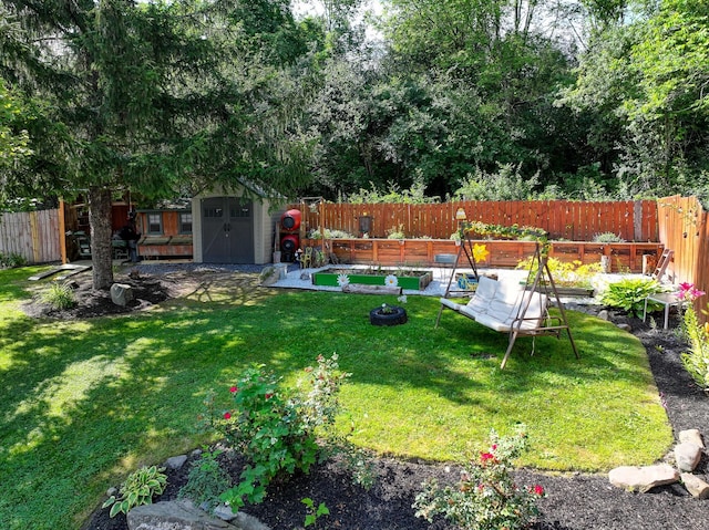 7 Walnut Ct, Goshen, NY 10924 - fenced backyard with a vegetable garden and a storage shed