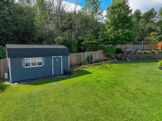 7 Walnut Ct, Goshen, NY 10924 - fenced backyard with a trampoline and a storage shed