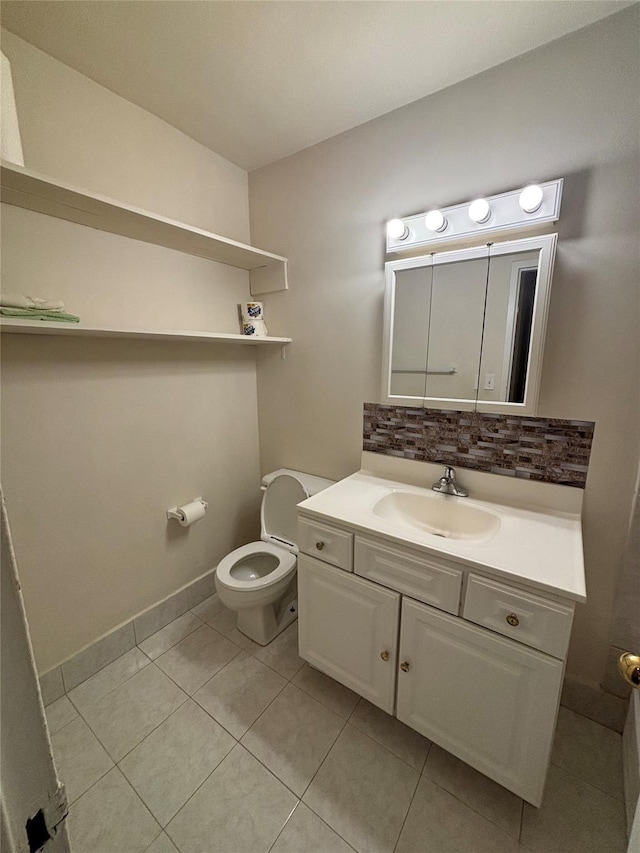124 Smith St Unit 3B, Freeport, NY 11520 - half bath with decorative backsplash, vanity, and tile patterned floors