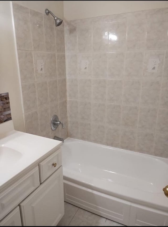 124 Smith St Unit 3B, Freeport, NY 11520 - full bath featuring shower / bathtub combination, vanity, and tile patterned flooring