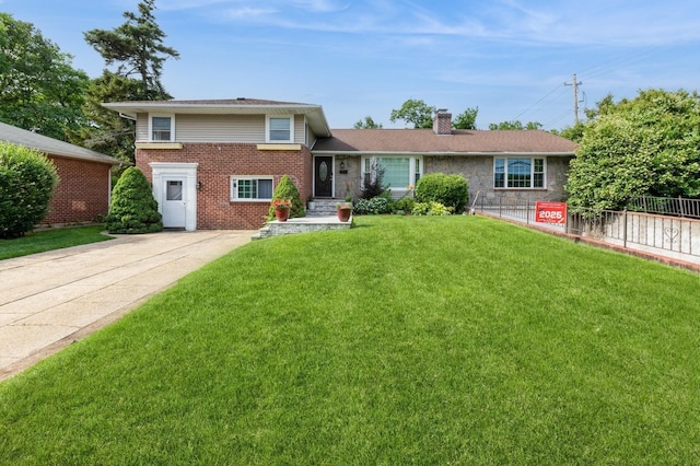 114 Birchwood Park Dr, Syosset, NY 11791 - split level home with a chimney and brick siding