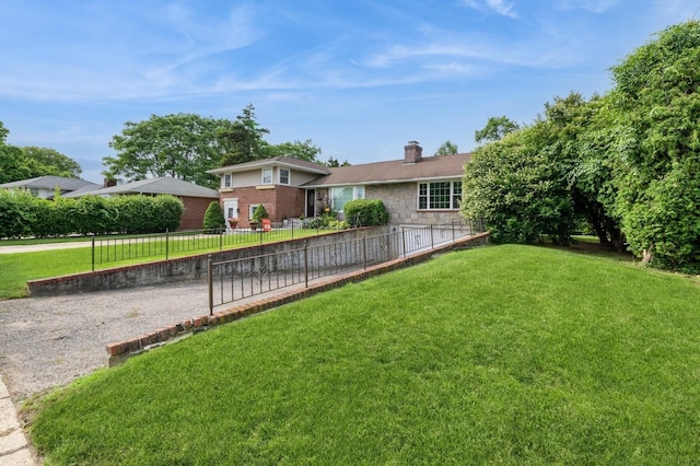 114 Birchwood Park Dr, Syosset, NY 11791 - split level home featuring a chimney