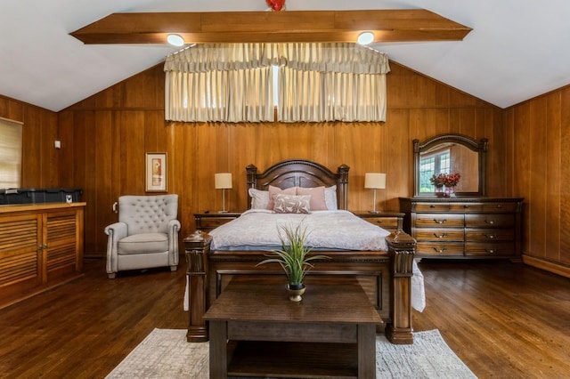 114 Birchwood Park Dr, Syosset, NY 11791 - bedroom with vaulted ceiling, wood walls, and wood finished floors