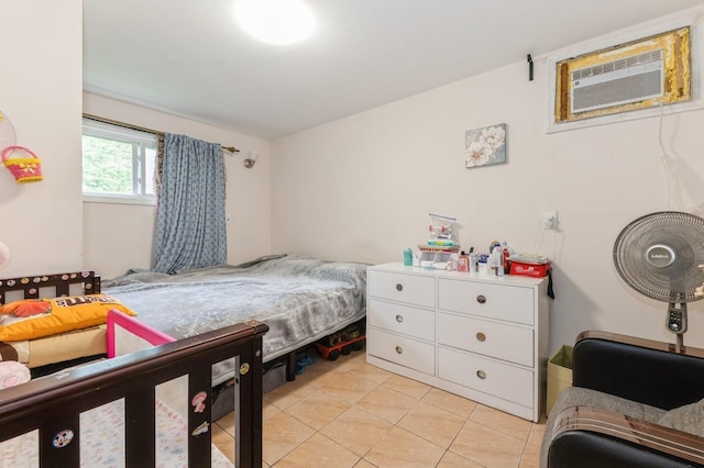 114 Birchwood Park Dr, Syosset, NY 11791 - bedroom featuring light tile patterned flooring and an AC wall unit