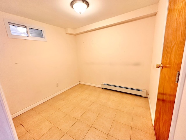 114 Birchwood Park Dr, Syosset, NY 11791 - unfurnished room featuring baseboard heating and light tile patterned floors