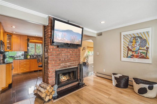 55 Duckpond Dr N, Wantagh, NY 11793 - living room featuring baseboard heating, ornamental molding, a brick fireplace, healthy amount of natural light, and recessed lighting