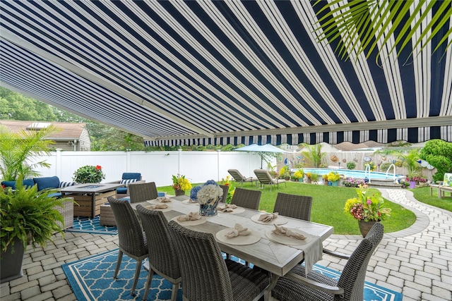 55 Duckpond Dr N, Wantagh, NY 11793 - fenced backyard featuring outdoor dining area, a patio area, and an outdoor fire pit
