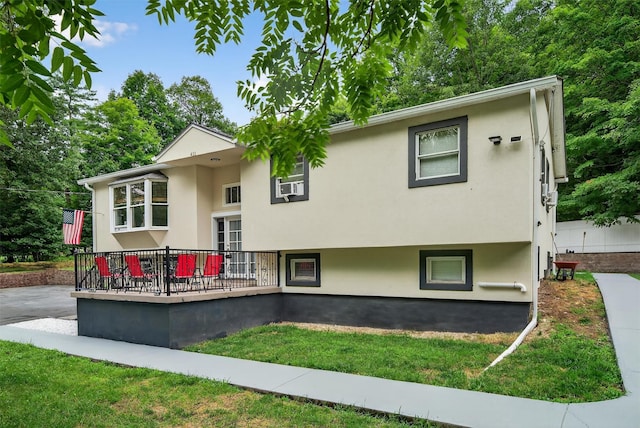 411 Fair Oaks Rd, Middletown, NY 10940 - view of front of property with stucco siding and cooling unit