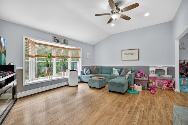 411 Fair Oaks Rd, Middletown, NY 10940 - living area featuring baseboard heating, lofted ceiling, wood finished floors, a ceiling fan, and recessed lighting