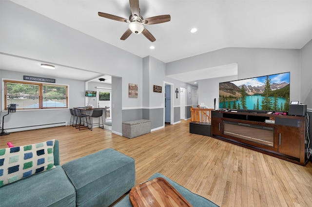 411 Fair Oaks Rd, Middletown, NY 10940 - living room featuring a baseboard heating unit, wood finished floors, ceiling fan, vaulted ceiling, and recessed lighting