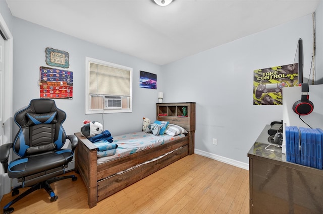 411 Fair Oaks Rd, Middletown, NY 10940 - bedroom featuring light wood-type flooring and cooling unit
