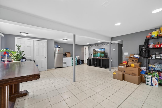 411 Fair Oaks Rd, Middletown, NY 10940 - finished basement featuring freestanding refrigerator, recessed lighting, and light tile patterned flooring