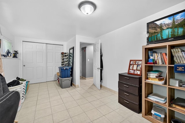 411 Fair Oaks Rd, Middletown, NY 10940 - living area featuring light tile patterned flooring and baseboards