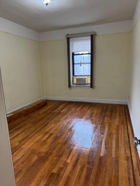 2925 Matthews Ave Unit 5F, Bronx, NY 10467 - empty room featuring wood finished floors and cooling unit