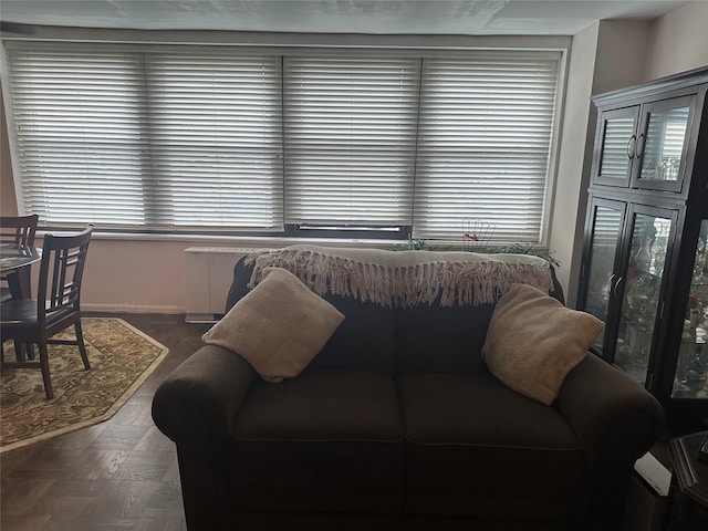 1835 Corporal Kennedy St Unit 1F, Bayside, NY 11360 - living room featuring baseboards