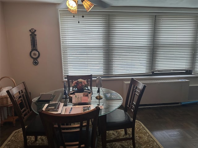 1835 Corporal Kennedy St Unit 1F, Bayside, NY 11360 - dining space with ceiling fan and radiator