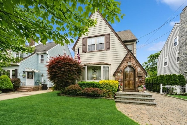 445 Wellington Rd, Mineola, NY 11501 - view of english style home
