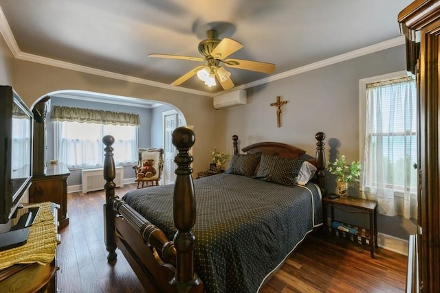 445 Wellington Rd, Mineola, NY 11501 - bedroom with arched walkways, an AC wall unit, radiator heating unit, wood finished floors, and crown molding