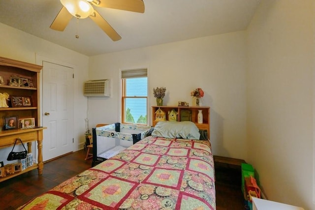 445 Wellington Rd, Mineola, NY 11501 - bedroom with wood finished floors, ceiling fan, and a wall mounted air conditioner