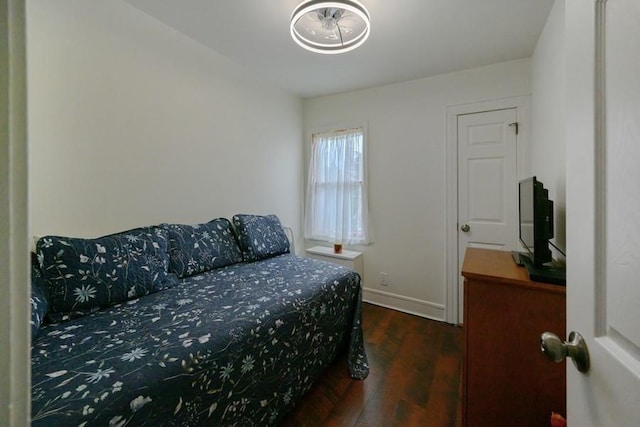 445 Wellington Rd, Mineola, NY 11501 - bedroom featuring wood finished floors and baseboards