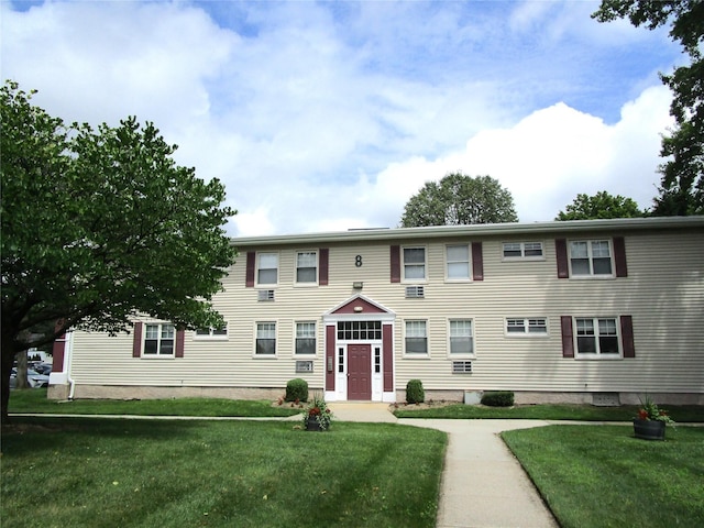 324 Post Ave Apt 8-J, Westbury, NY 11590 - colonial inspired home with a front lawn