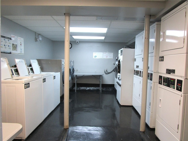 324 Post Ave Apt 8-J, Westbury, NY 11590 - shared laundry featuring stacked washer and clothes dryer and washer and dryer
