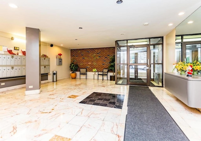 75 W 238th St Unit 3H, Bronx, NY 10463 - community lobby featuring recessed lighting and brick wall