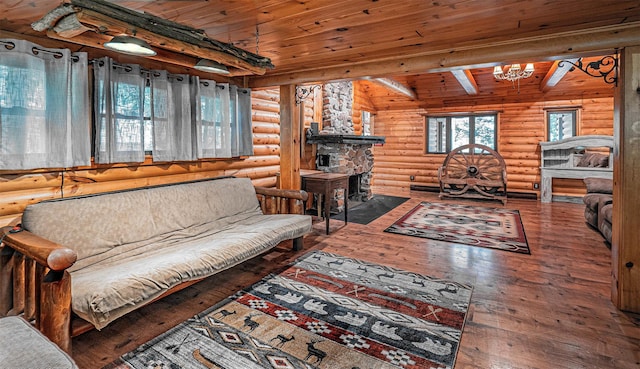 444 Buttermilk Falls Rd, Warwick, NY 10990 - living area featuring rustic walls, hardwood / wood-style floors, and a wood stove