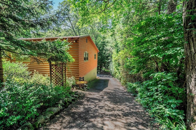 444 Buttermilk Falls Rd, Warwick, NY 10990 - view of side of home with log veneer siding