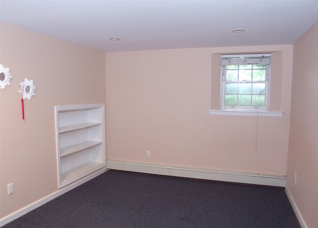 103 Arlington Rd, Lake Ronkonkoma, NY 11779 - unfurnished room with a baseboard heating unit and recessed lighting