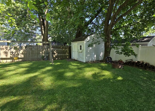 103 Arlington Rd, Lake Ronkonkoma, NY 11779 - fenced backyard featuring a storage shed