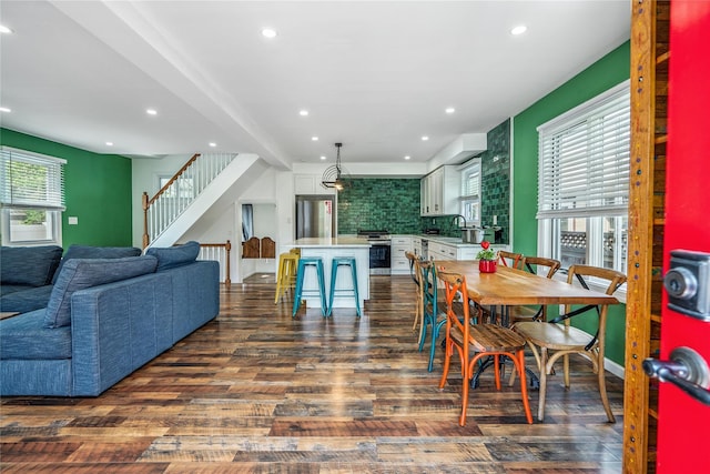 1644 Kenneth Ave, Baldwin, NY 11510 - dining room with dark wood-type flooring, stairs, and recessed lighting