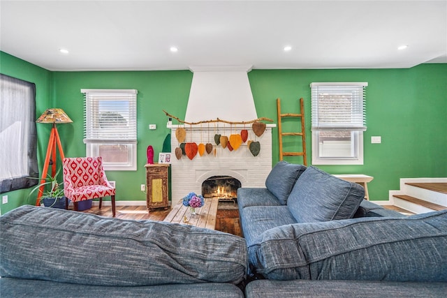 1644 Kenneth Ave, Baldwin, NY 11510 - living room with cooling unit, wood finished floors, a fireplace, and recessed lighting