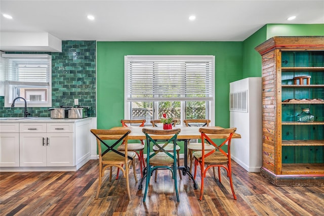 1644 Kenneth Ave, Baldwin, NY 11510 - dining room featuring a heating unit, dark wood finished floors, and recessed lighting