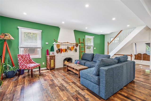 1644 Kenneth Ave, Baldwin, NY 11510 - living room with hardwood / wood-style flooring, recessed lighting, a fireplace, and stairs