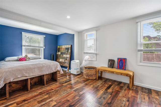 1644 Kenneth Ave, Baldwin, NY 11510 - bedroom with multiple windows, wood finished floors, and recessed lighting