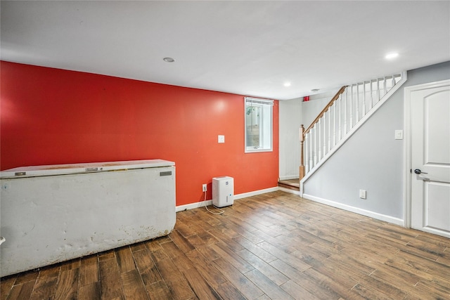 1644 Kenneth Ave, Baldwin, NY 11510 - empty room with wood finished floors, stairs, and recessed lighting