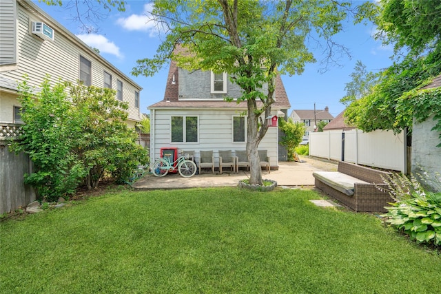 1644 Kenneth Ave, Baldwin, NY 11510 - rear view of house with a patio, a fenced backyard, and a shingled roof